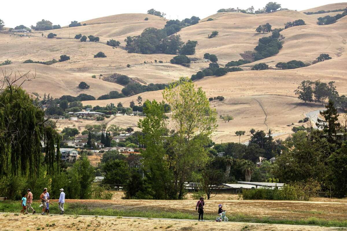 The hills of the Sierra Vista Open Space Preserve can be seen from part of the Bay Area Ridge Trail at Penitencia Creek Park in San Jose, Calif., Monday, July 26, 2021. The trail is 550 miles of proposed route which would bypass the nine-county area.  It is approaching 400 miles of track completed after 30 years of work.