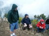 LHC hikers on the wet cloudy summit