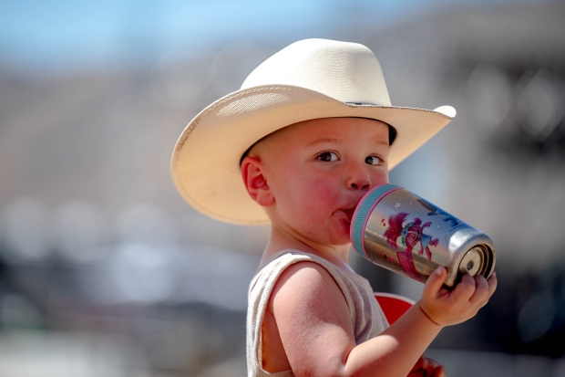 Nikolaas Love, a 2-year-old Yucaipa boy, holds a glass...
